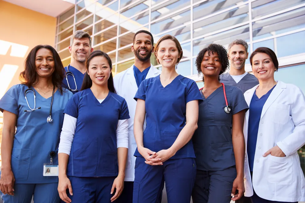 Medical team of physicians and nurses standing together
